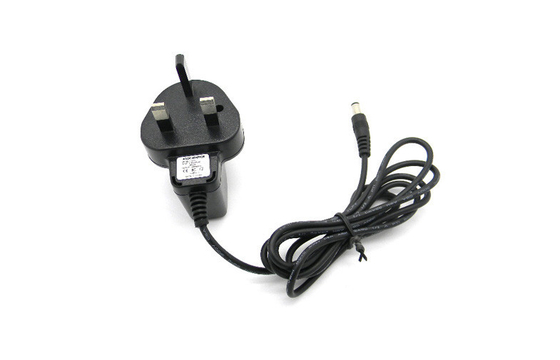 DC6V 500mA Switching Adapter Wall Mount ไฟฟ้าผ่านแรงดันไฟฟ้าของสหราชอาณาจักรเสียบ