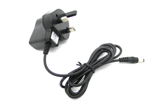 DC6V 500mA Switching Adapter Wall Mount ไฟฟ้าผ่านแรงดันไฟฟ้าของสหราชอาณาจักรเสียบ
