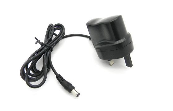 DC6V 500mA Switching Adapter Wall Mount ไฟฟ้าผ่านแรงดันไฟฟ้าของสหราชอาณาจักรเสียบ