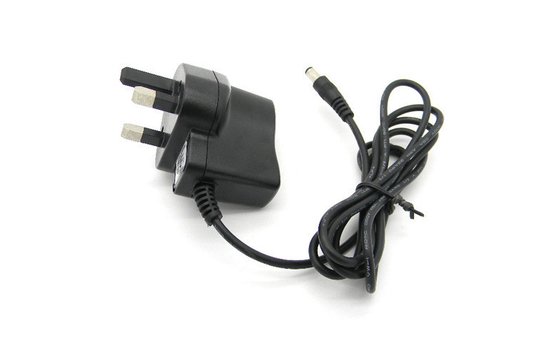 DC6V 500mA Switching Adapter Wall Mount ไฟฟ้าผ่านแรงดันไฟฟ้าของสหราชอาณาจักรเสียบ